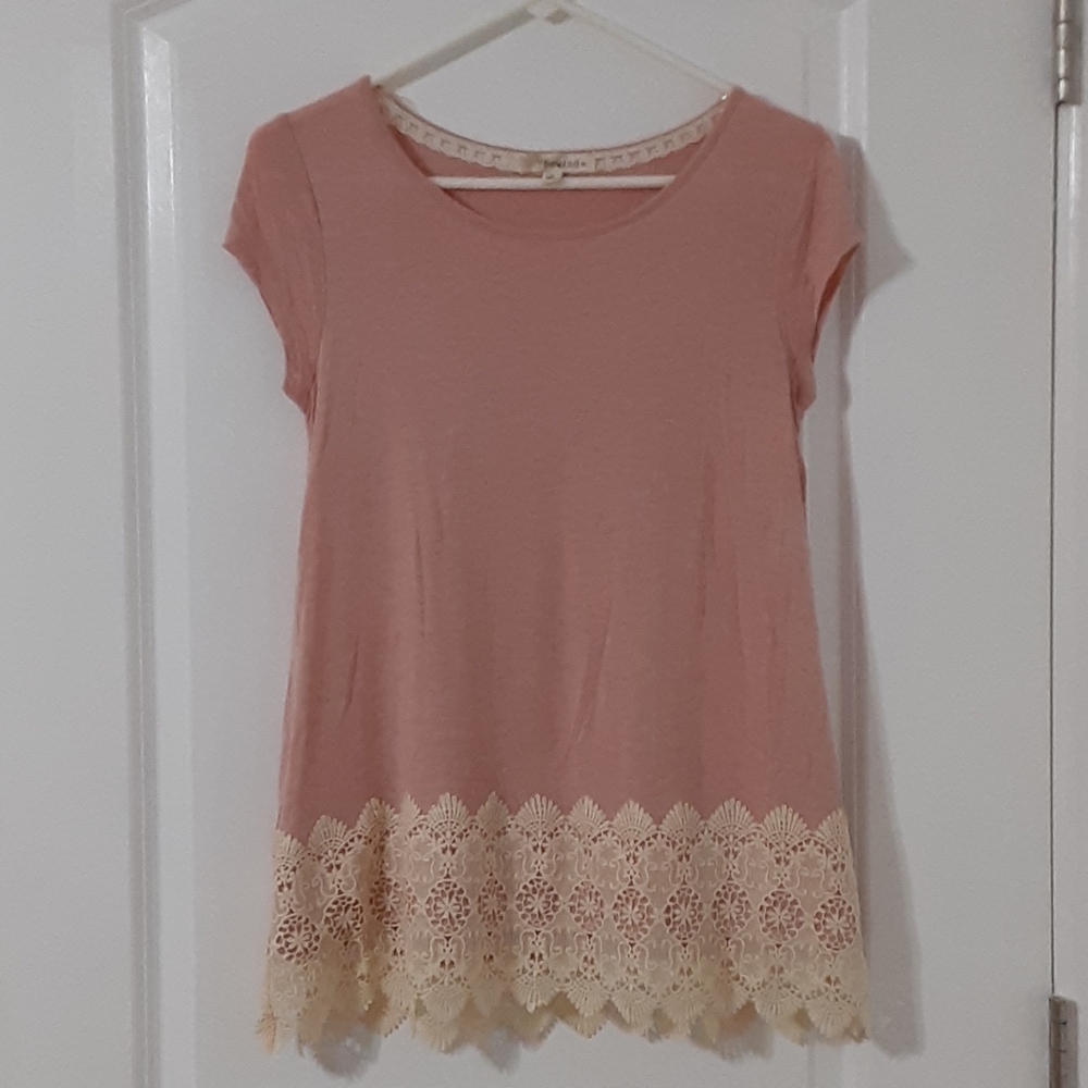 Rewind pink top with off white lace trim.